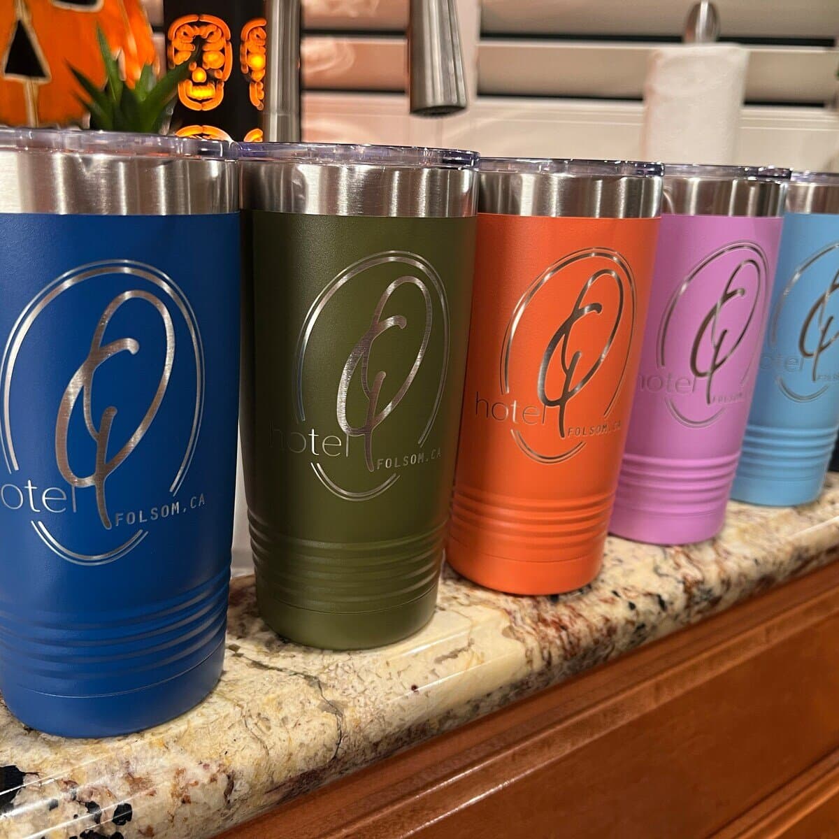 Hotel branded tumblers in five colors
